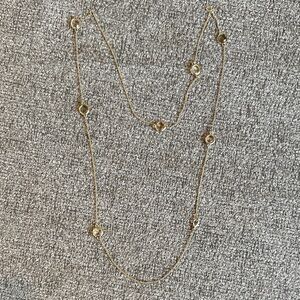 Elegant Gold Necklace with Clear Bead Accents